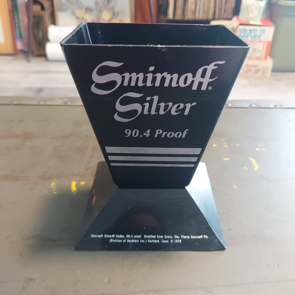 Vintage 1978 Smirnoff Silver 90.4 Proof Vodka Plastic Bottle Display Stand Black
